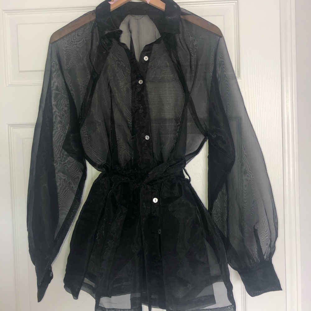 Sheer black peplum top